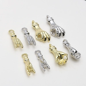 Golden and silver metal hand gesture charms for DIY jewelry making with polished finish