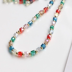Colorful square crystal bead necklace with gold spacers in a minimalist luxury design