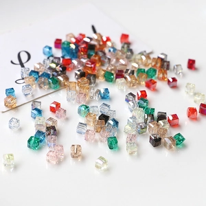 Macro shot of colorful faceted crystal cube beads for DIY jewelry making and crafts