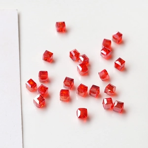 Macro shot of faceted red crystal cube beads for DIY jewelry making and earrings