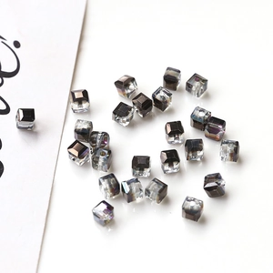 Macro view of colorful faceted square crystal beads for DIY handmade jewelry crafts