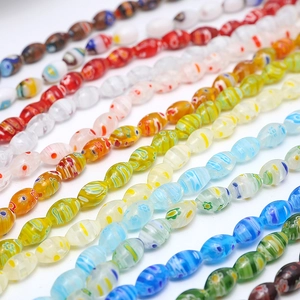 Oval millefiori glass beads with colorful floral patterns for DIY jewelry making