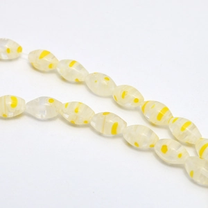 Macro detail of oval floral millefiori glass beads for DIY jewelry making
