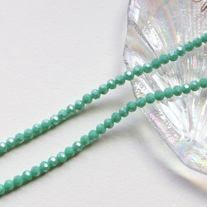 Detail of 4mm faceted mint green crystal wheel beads for DIY jewelry making