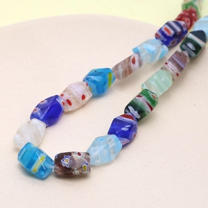 Macro shot of colorful millefiori faceted glass beads for DIY jewelry making