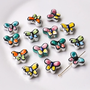 Perline a farfalla in ceramica dipinte a mano per gioielli fai-da-te in vari colori