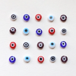 Flat round evil eye glass beads in assorted colors for handmade jewelry DIY projects