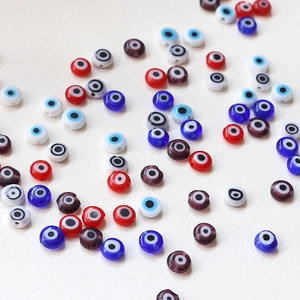 Flat round evil eye glass beads for DIY jewelry making in multiple vibrant colors