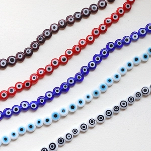 Flat evil eye glass beads in five colors for DIY jewelry making and handmade bracelets