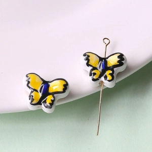 Macro di perline a farfalla in ceramica dipinte a mano per accessori di gioielleria