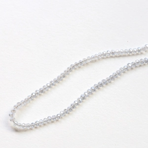 Macro detail of faceted light blue crystal beads for handmade jewelry DIY necklaces