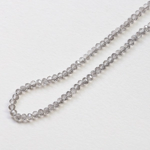 Macro shot of grey faceted crystal beads for DIY jewelry making and handmade crafts