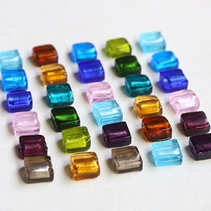 Colorful translucent square glass beads for DIY jewelry making in various vibrant colors