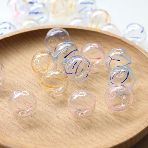 Handmade clear glass beads with colorful spiral patterns for DIY jewelry making