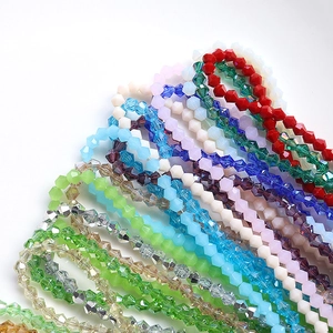Macro shot of 4mm faceted bicone crystal beads for DIY jewelry making in various colors