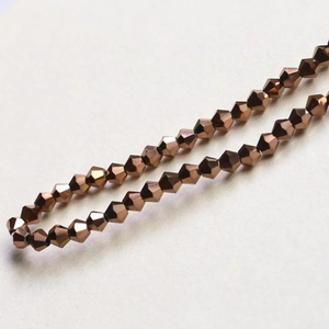 Macro detail of 4mm multifaceted bronze crystal beads for DIY jewelry making