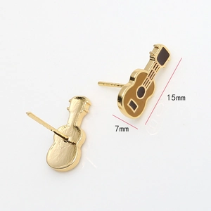 Macro view of gold-plated ukulele guitar earrings with black enamel and S925 studs