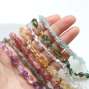 Handheld assorted irregular natural amethyst and citrine polished gemstone beads string