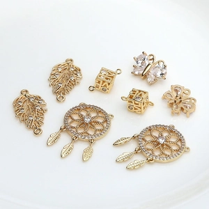 Gold-plated brass pendants set with zircon dreamcatcher butterfly and leaf charms