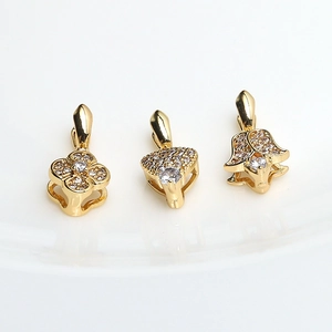 Gold plated pendant clasps with clover, heart and tulip shapes and cubic zirconia