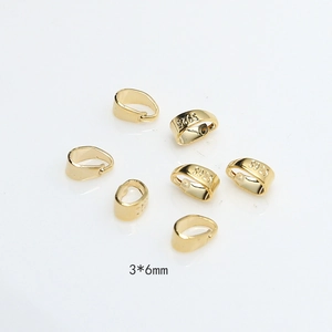 Detail showing seven 3x6mm gold-plated S925 sterling silver pinch bails for DIY jewelry