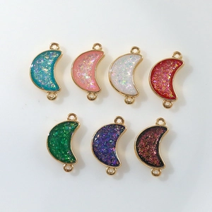 Set of gold-plated crescent moon charms with sparkling resin and double hanging loops