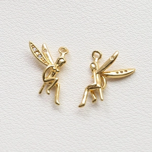 Pendentifs fée dorés avec ailes en strass pour bijoux DIY sur cuir blanc