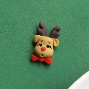 Detailed view of cute resin reindeer cabochon for DIY hair accessories and phone cases