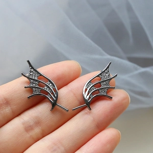 Gothic bat wing earrings in gunmetal finish with shimmering zircon crystals