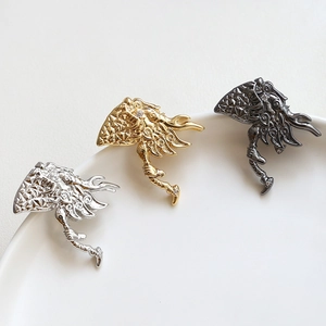 Fantasy axe and wing pins in gold and silver finish with zircon stone accents