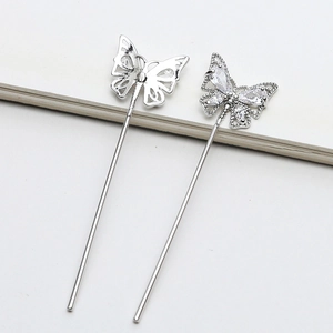 Detailed front and back view of silver butterfly wand with shimmering cubic zirconia