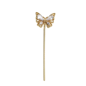 Gold-plated butterfly wand hair pin with cubic zirconia and baroque pearl accents