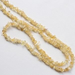 Detail of yellow candy-colored irregular natural tourmaline stone beads for DIY jewelry