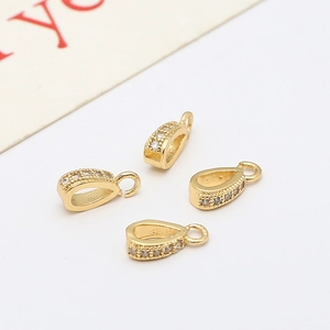 Détail de 4 bélières dorées avec zircone cubique pour la création de bijoux DIY