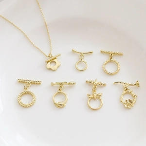 Sammlung von 14k vergoldeten OT-Verschlüssen mit Blumen-, Libellen- und Strukturdesign