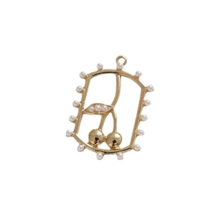 Golden cherry pendant with pearl accents for DIY jewelry making and craft projects