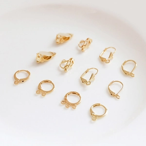 Detailed assortment of 14k gold-plated leverback earrings and DIY jewelry making components