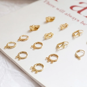 Selection of 14k gold-filled DIY earring components and circular hoops for jewelry making