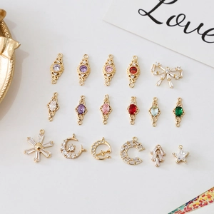 18k gold plated charms with moon star and snowflake designs for DIY jewelry making