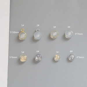 Eight styles of silicone earring backs with silver and gold metal loops for DIY jewelry making