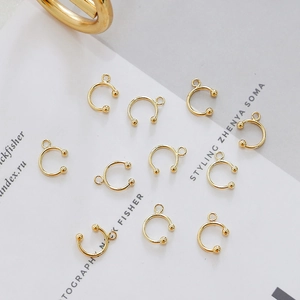 Detailed view of 18k gold plated C-shaped ear cuff components for DIY jewelry making
