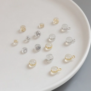 Transparent silicone earring backs with metal loops in gold and silver finish