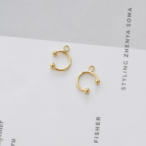 Golden C-shaped ear cuff with balls and top loop for DIY jewelry making