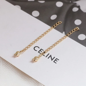 Detail of 14k gold plated tulip flower pendants on delicate DIY jewelry chains
