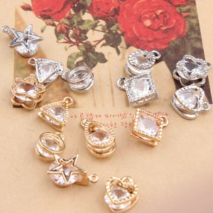 Detail of geometric metal charms with zircon inlays for DIY jewelry necklace making