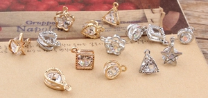 DIY jewelry pendants with geometric star and heart shapes inlaid with zircon stones