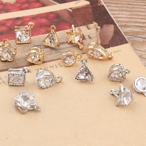Geometric metal pendants with cubic zirconia in star, heart, and square shapes