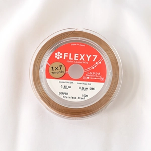 Close-up of 0.40mm nylon-coated 7-strand stainless steel jewelry wire in bronze finish