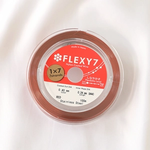 Detailed view of 0.40mm red nylon coated 7-strand stainless steel jewelry wire 100m spool