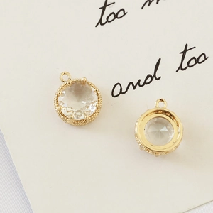 Macro view of gold plated castle style zircon pendant charms for DIY jewelry making